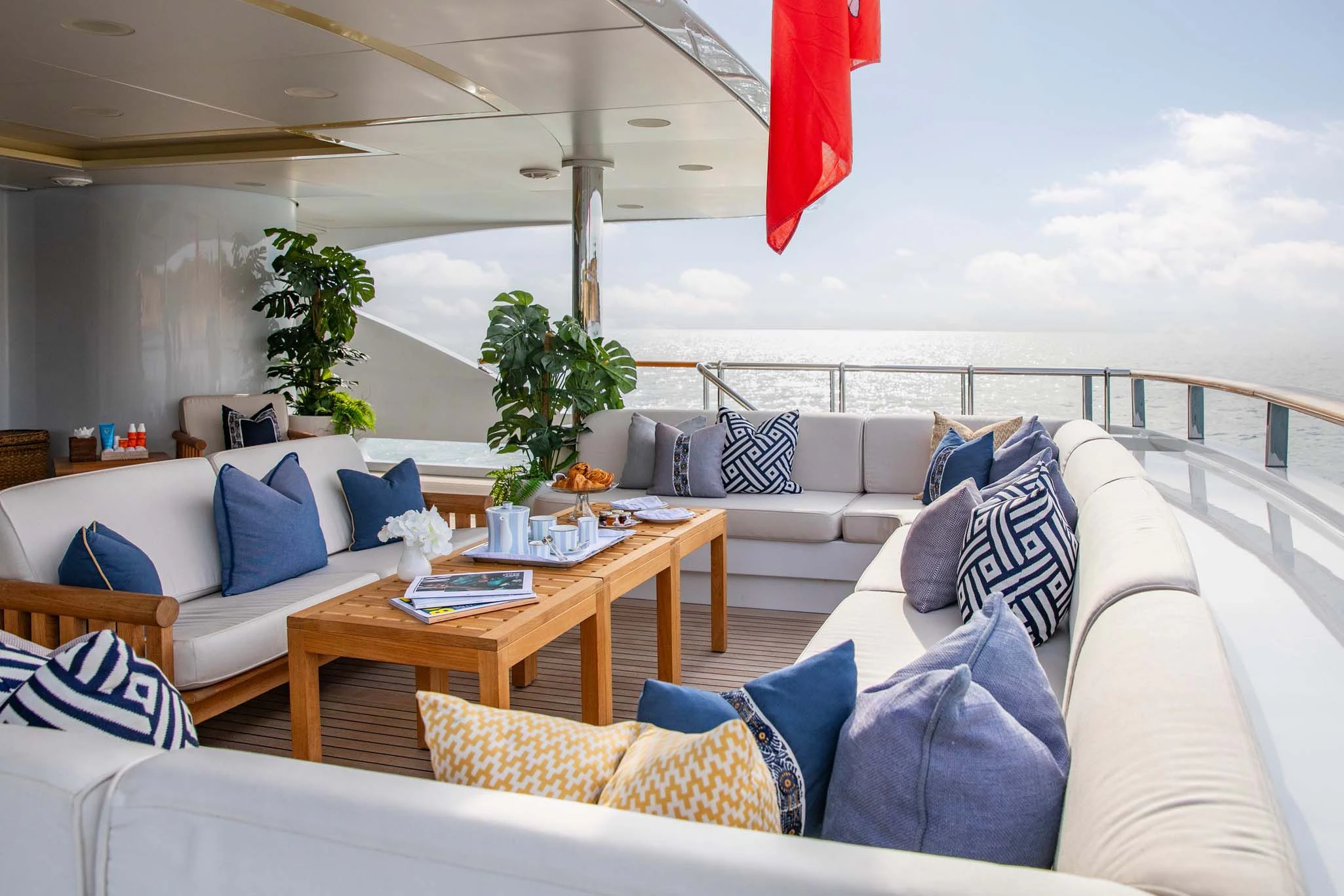 a living room with a large patio aboard LA BLANCA Yacht for Sale