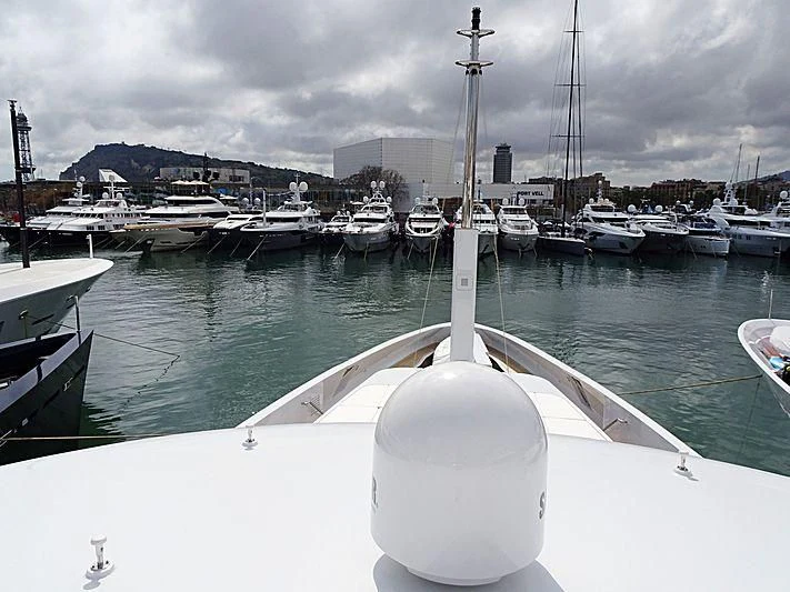 a boat in a harbor aboard LA BLANCA Yacht for Sale