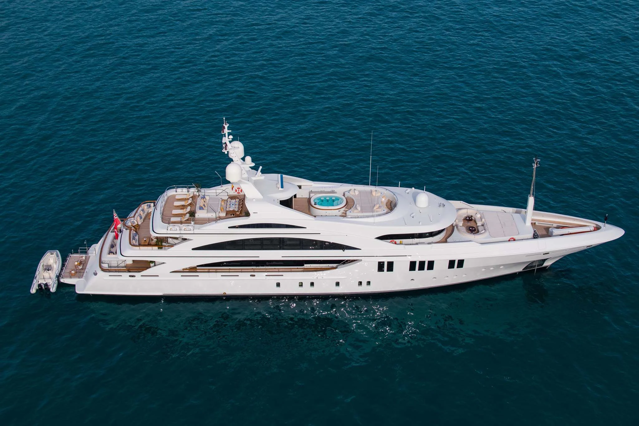 a white yacht in the ocean aboard LA BLANCA Yacht for Sale