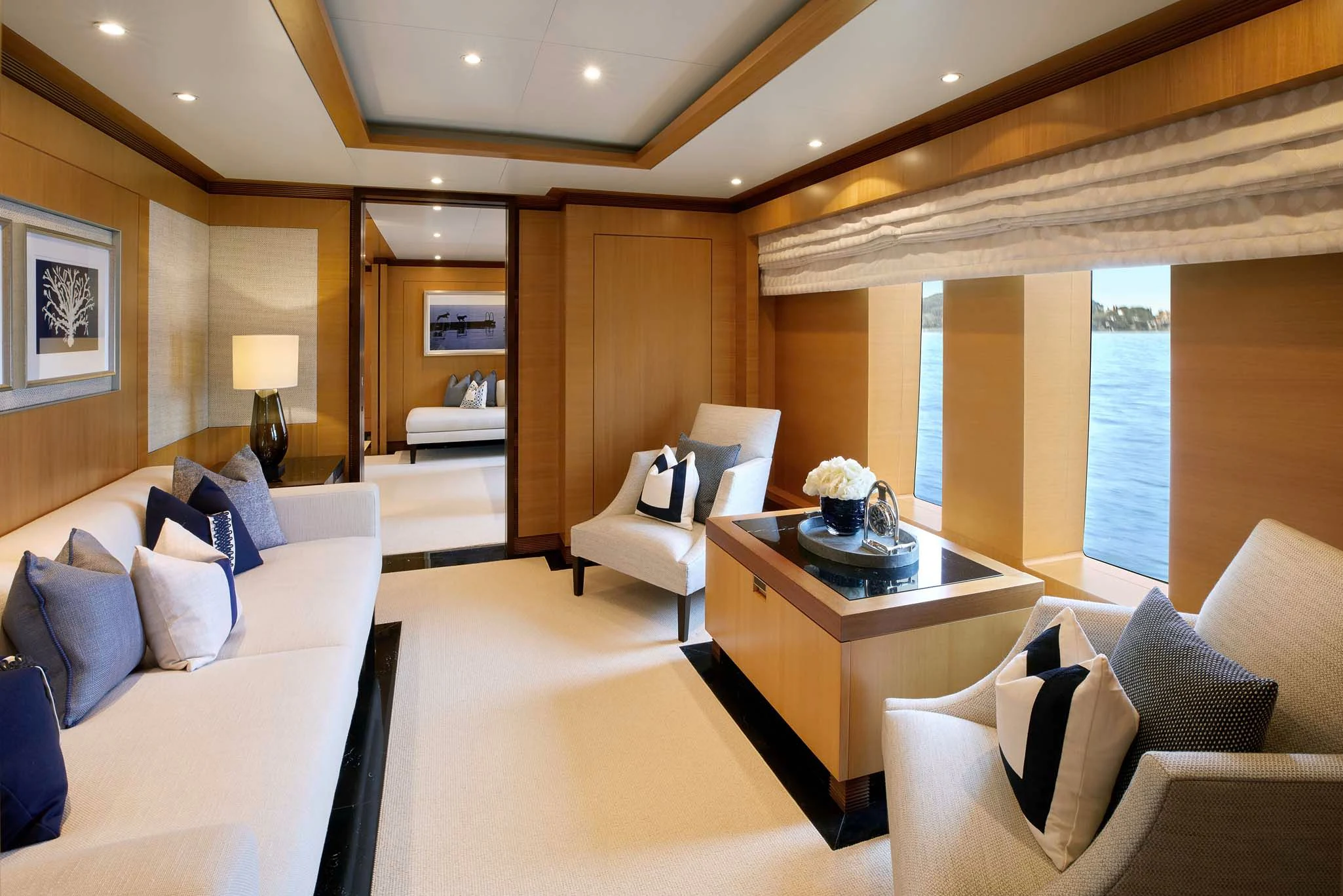 a living room with a large window aboard LA BLANCA Yacht for Sale