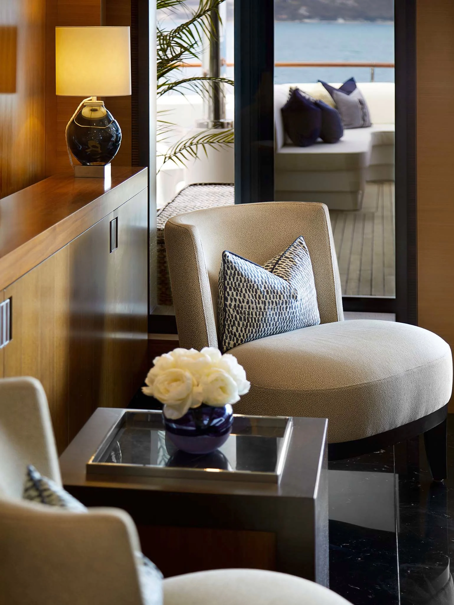 a room with a table and chairs aboard LA BLANCA Yacht for Sale