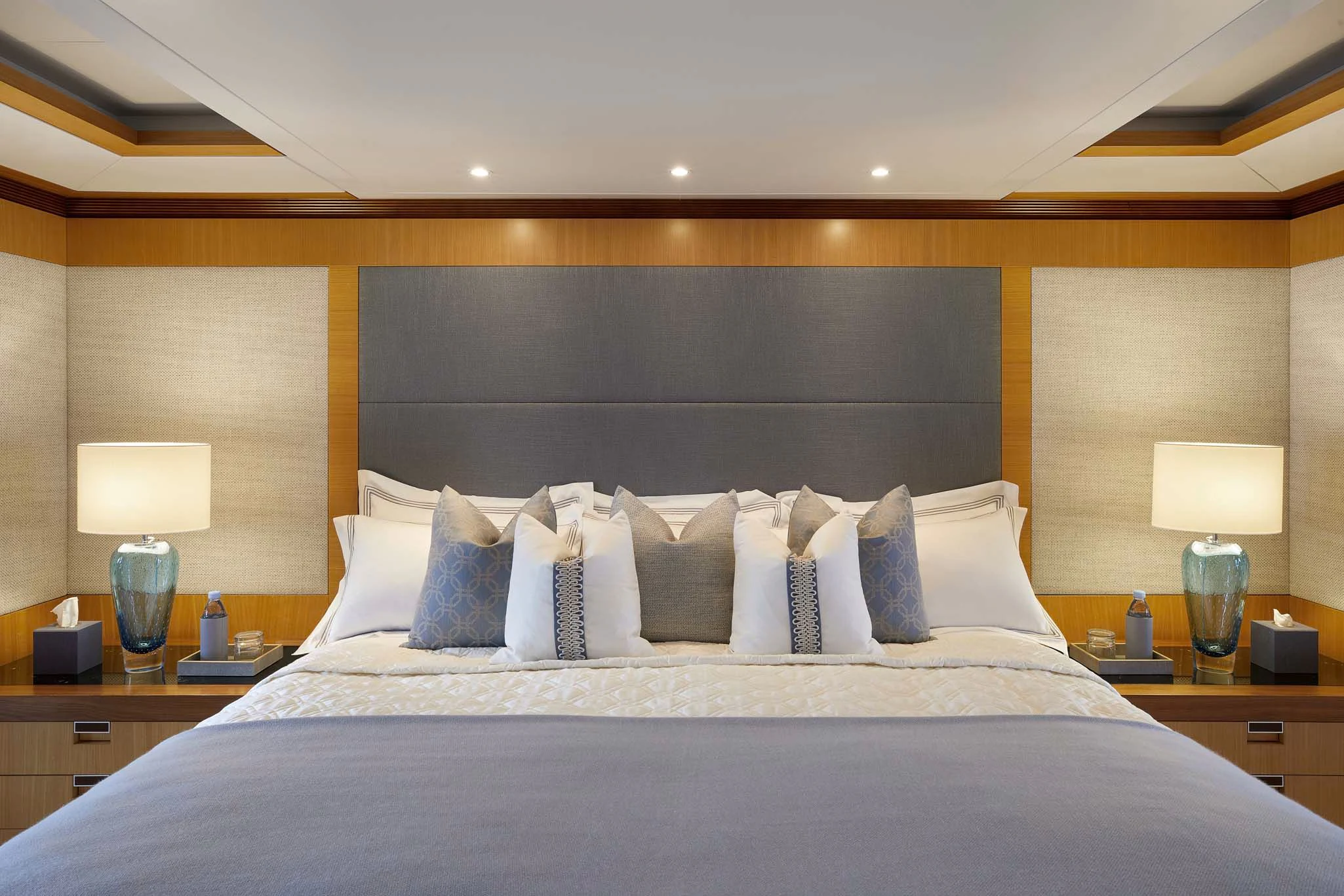 a large bed with white pillows aboard LA BLANCA Yacht for Sale