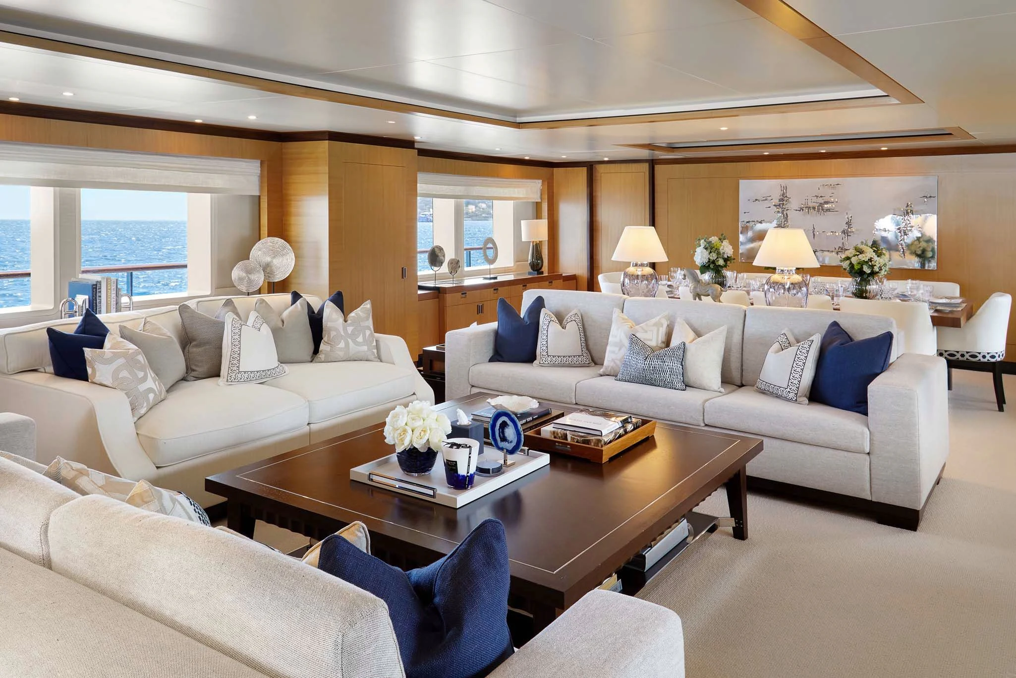 a living room with a couch and a coffee table aboard LA BLANCA Yacht for Sale