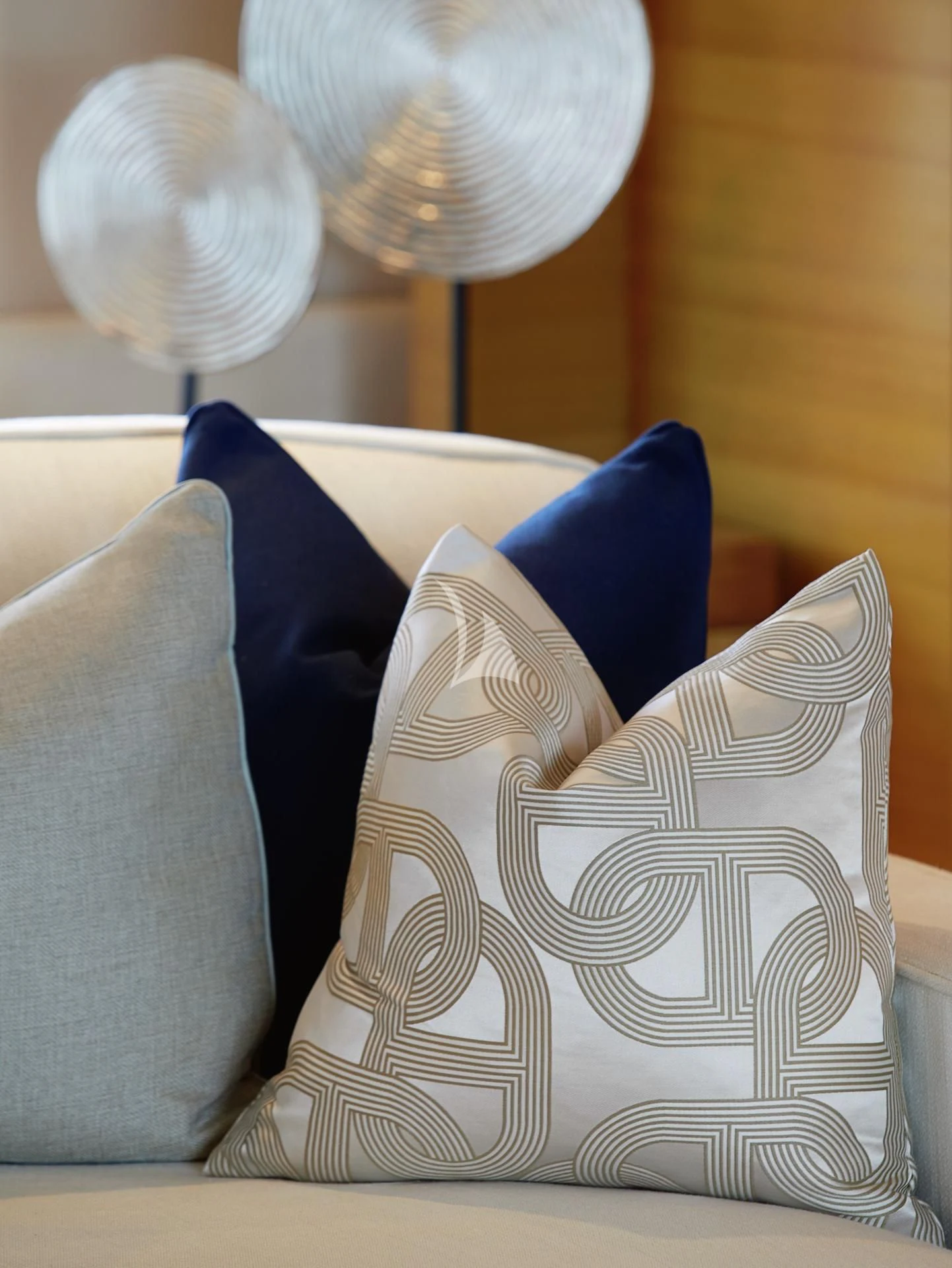 a white and blue pillow on a white chair aboard LA BLANCA Yacht for Sale