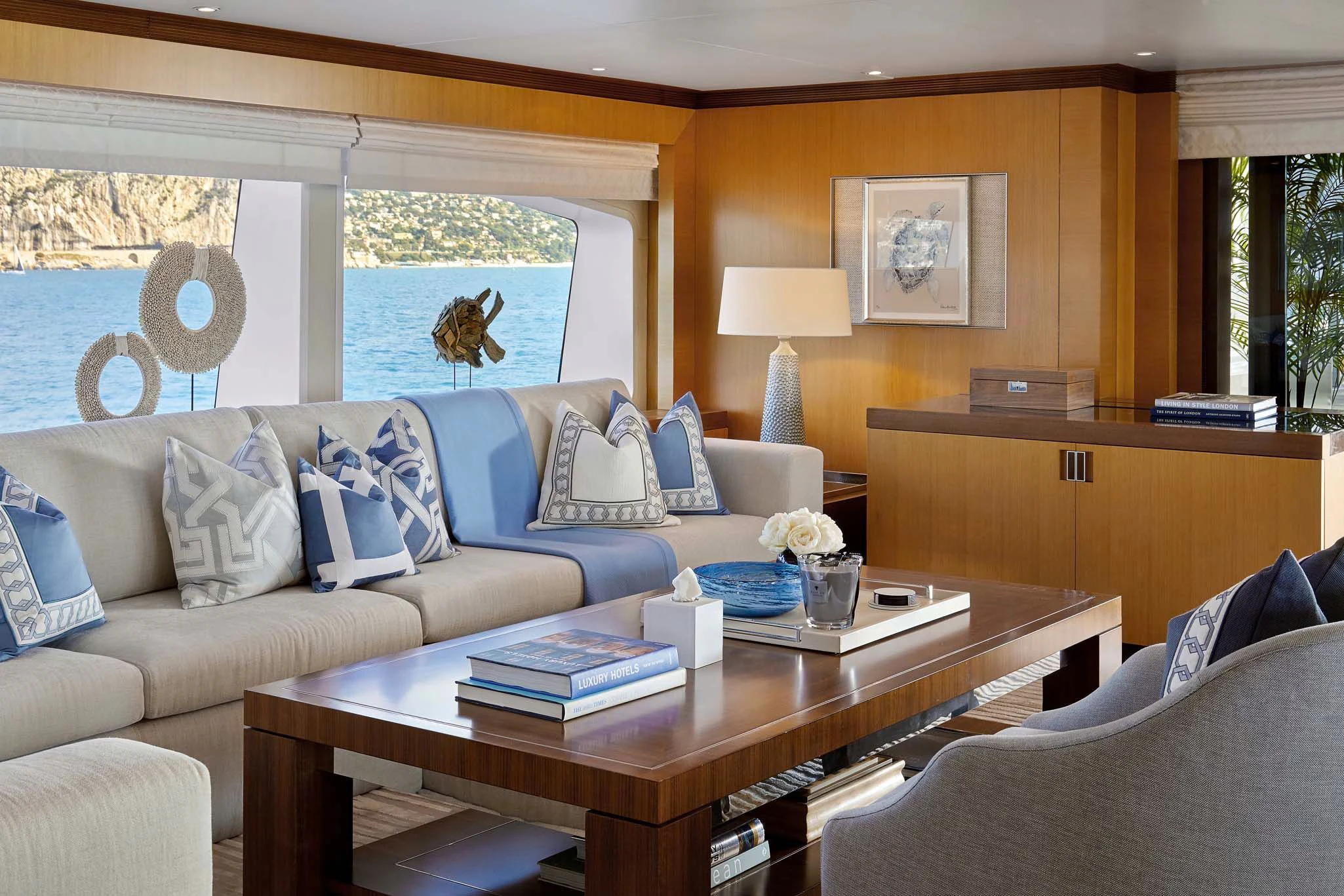 a living room with a couch and a coffee table aboard LA BLANCA Yacht for Sale