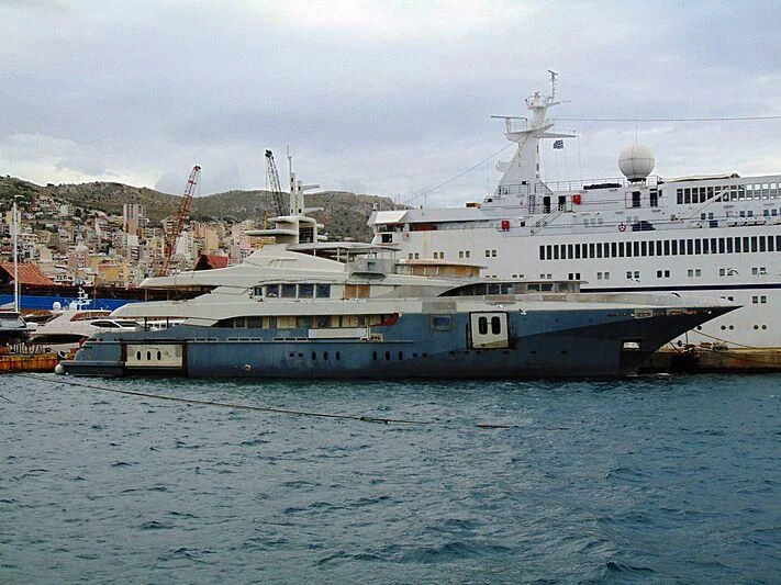 a large ship in the water aboard BLUE DESIRE Yacht for Sale