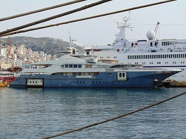 a large ship in the water aboard BLUE DESIRE Yacht for Sale