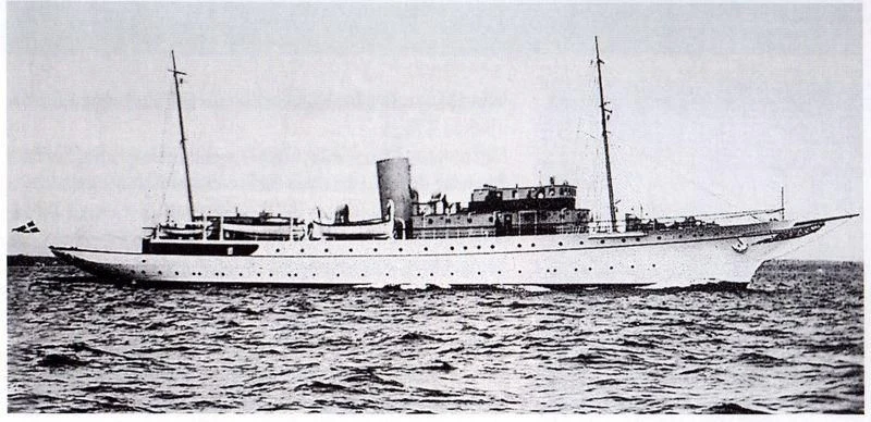 a large ship in the water aboard DANNEBROG Yacht for Sale