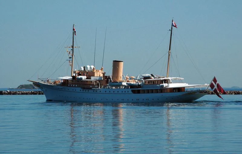 a large ship in the water aboard DANNEBROG Yacht for Sale