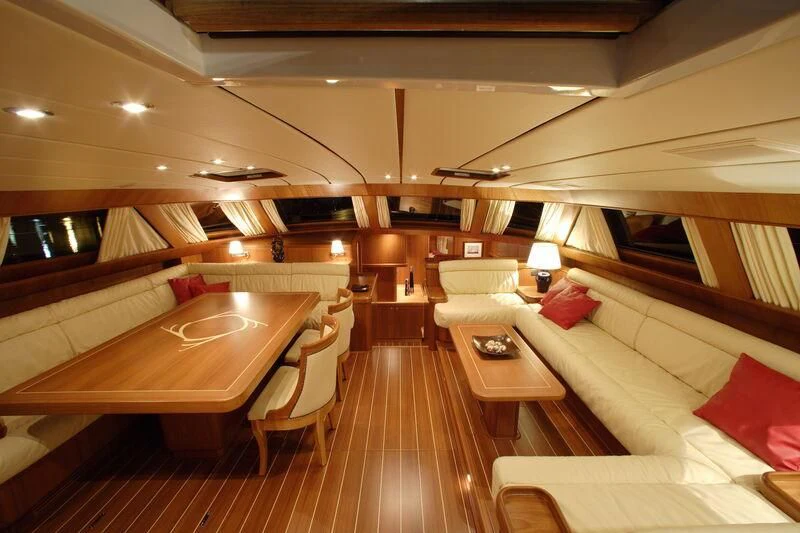a room with a bed and a couch aboard STARFALL Yacht for Sale