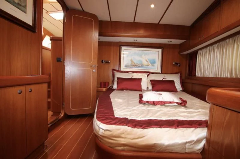 a bed in a room aboard STARFALL Yacht for Sale