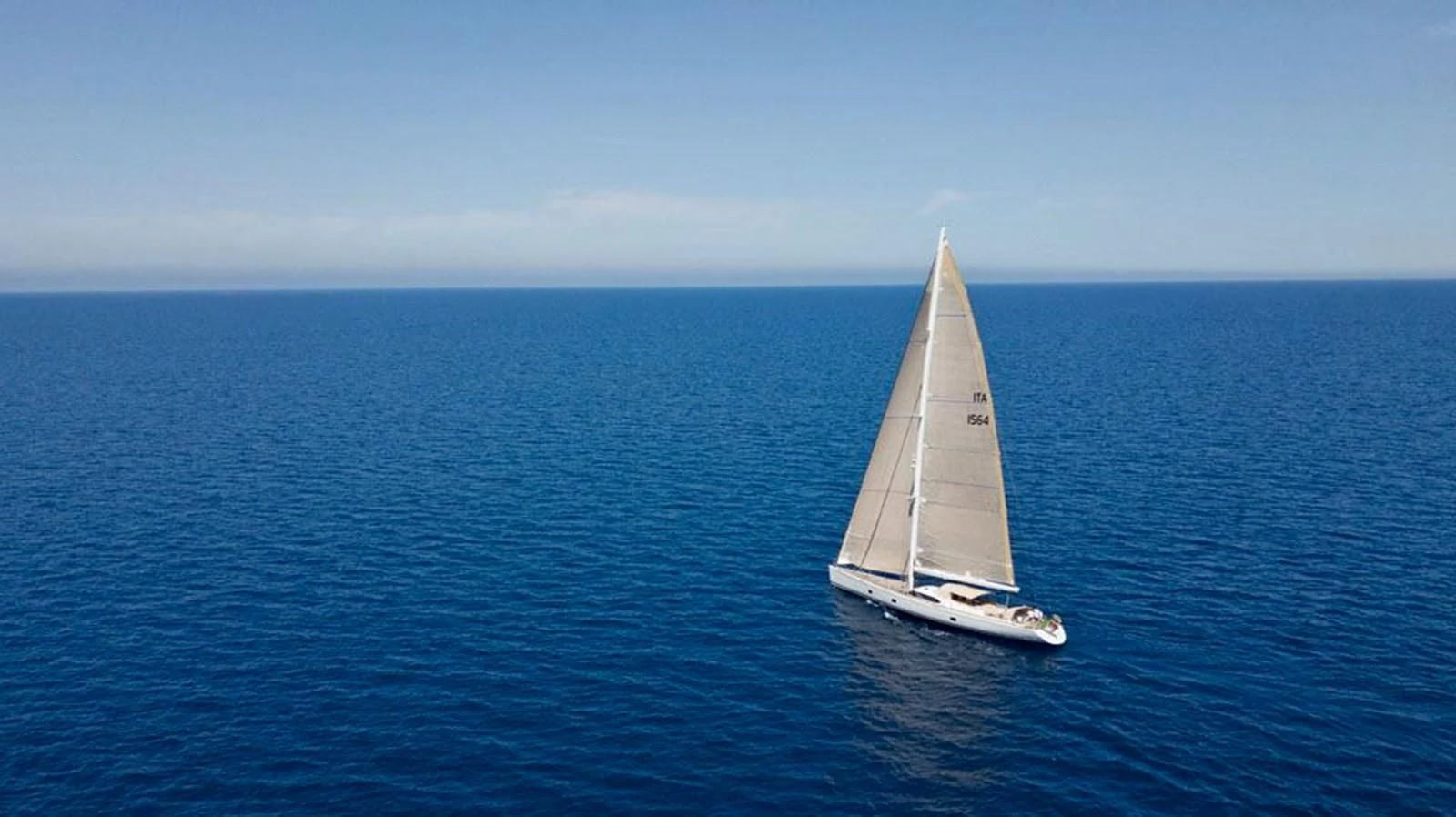 a sailboat in the ocean aboard STARFALL Yacht for Sale