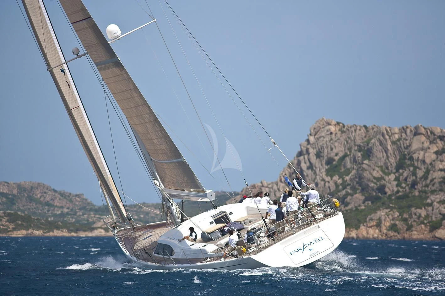 a boat sailing on the water aboard STARFALL Yacht for Sale