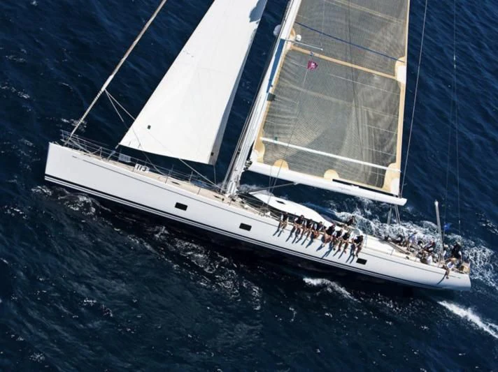 a large white boat with people on it aboard STARFALL Yacht for Sale
