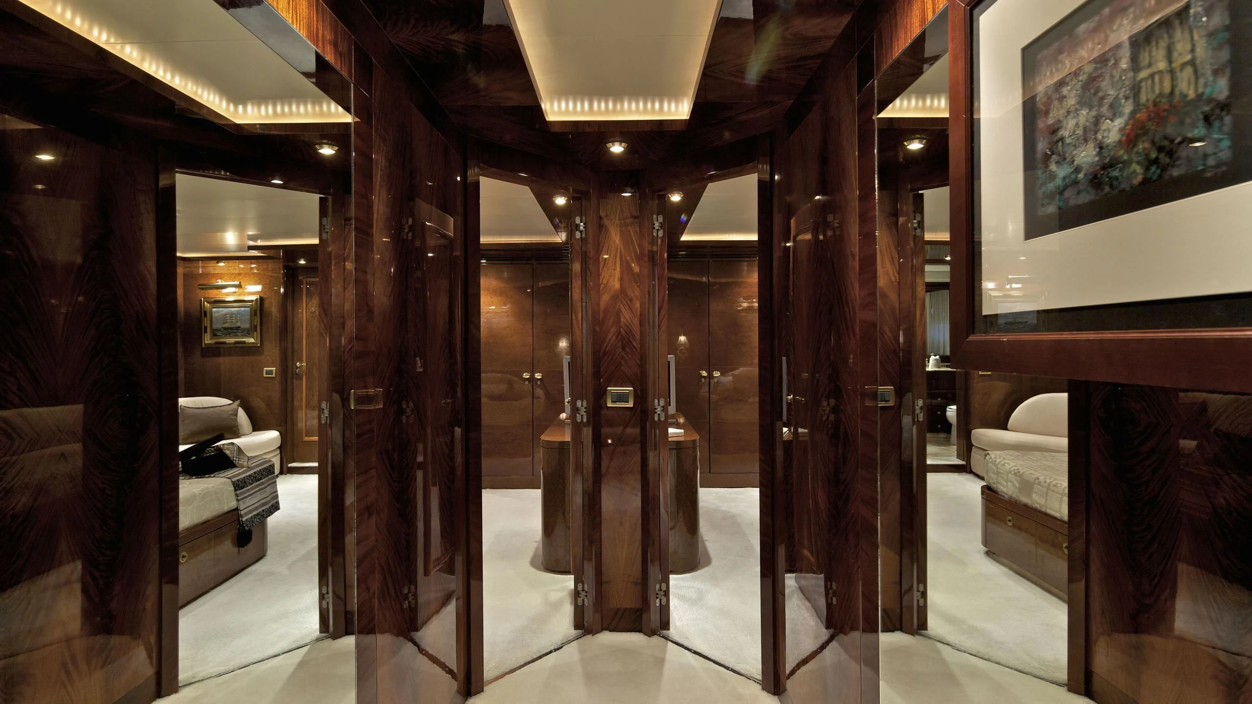 a room with a large mirror aboard O'RION Yacht for Charter