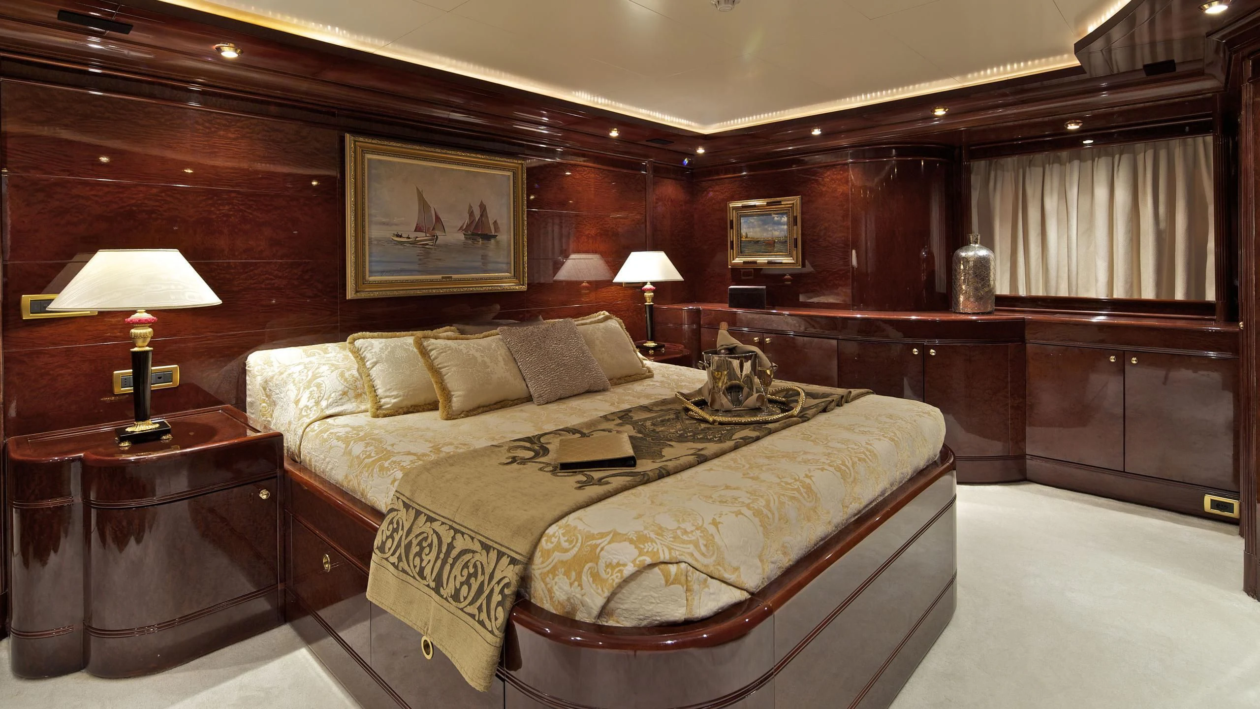 a bed in a room aboard O'RION Yacht for Charter