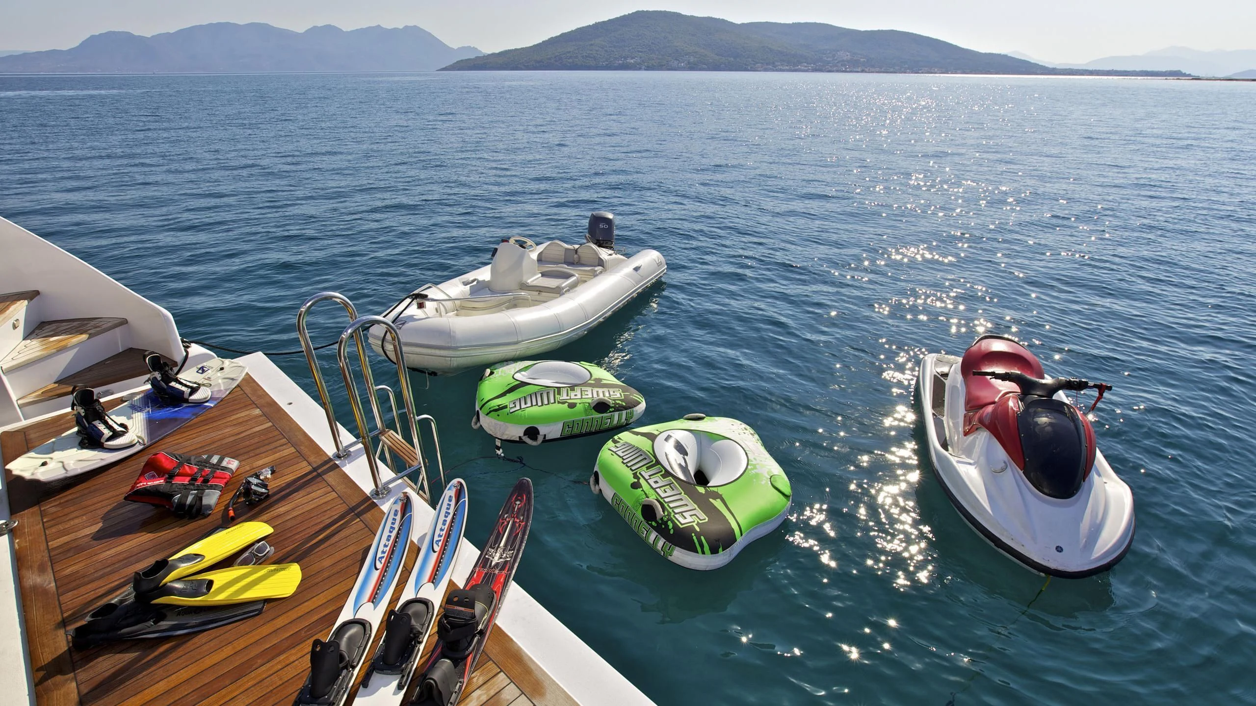 a boat with a motor attached to it aboard O'RION Yacht for Charter