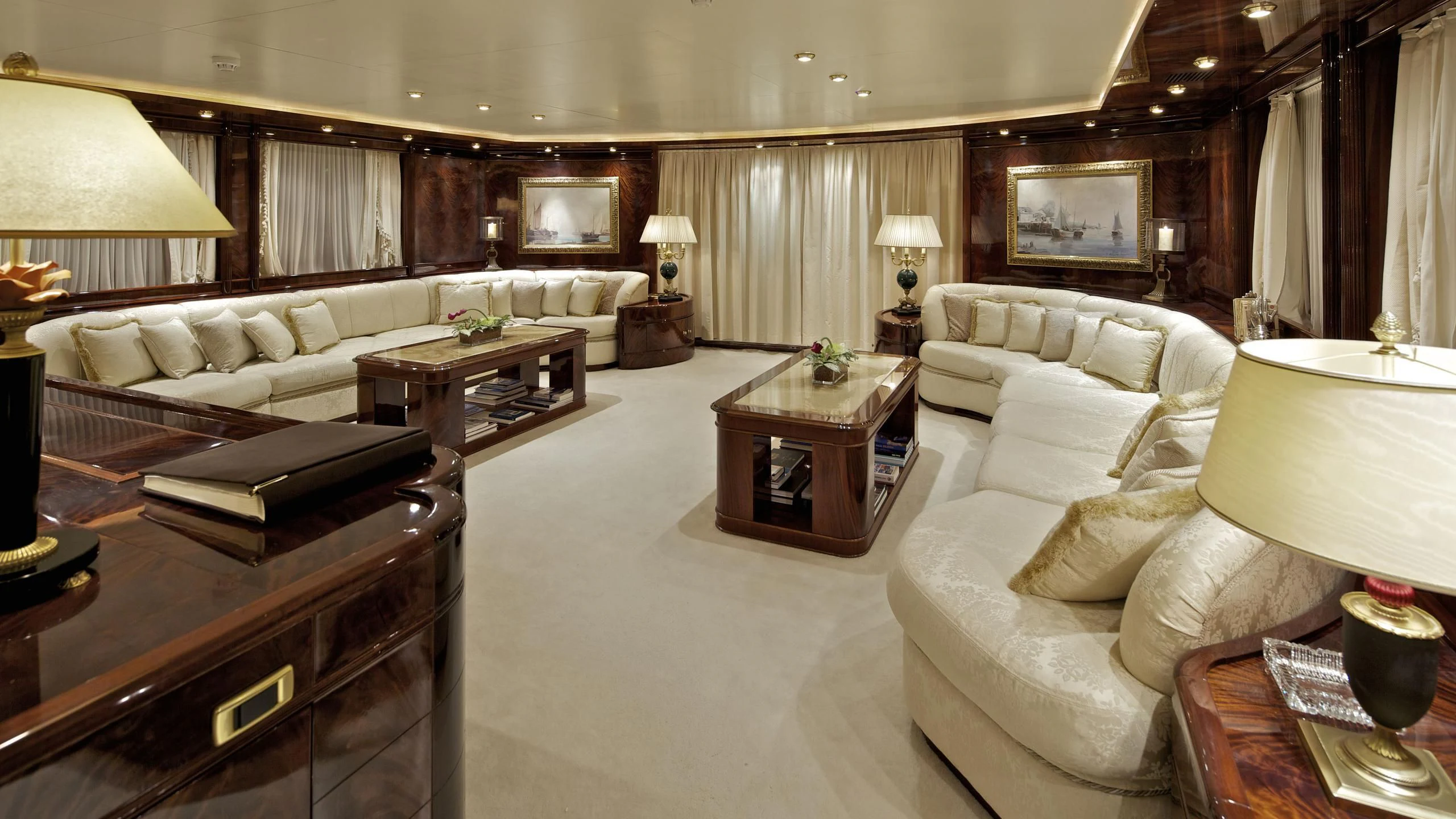 a living room with a couch and a coffee table aboard O'RION Yacht for Charter