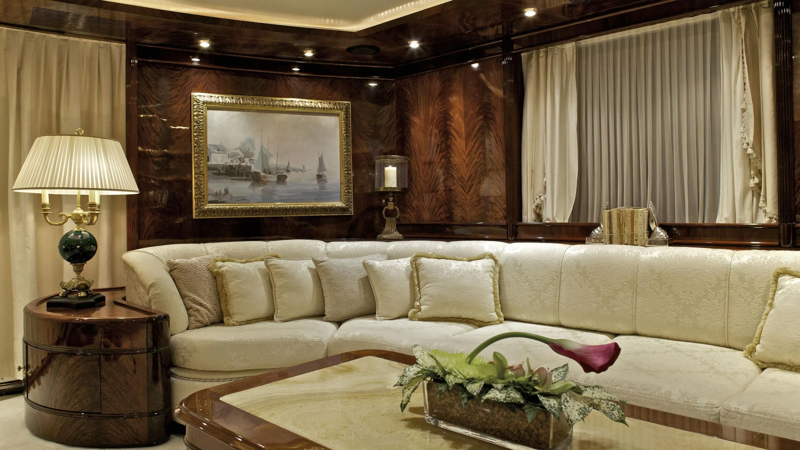 a living room with a couch and a table aboard O'RION Yacht for Charter