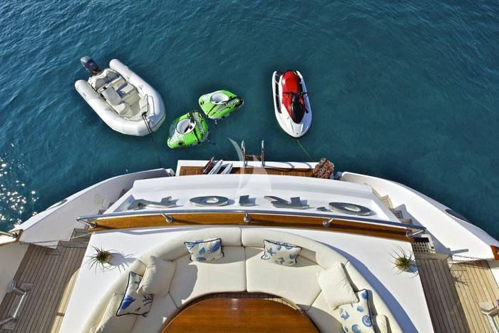 a group of boats on a body of water aboard O'RION Yacht for Charter