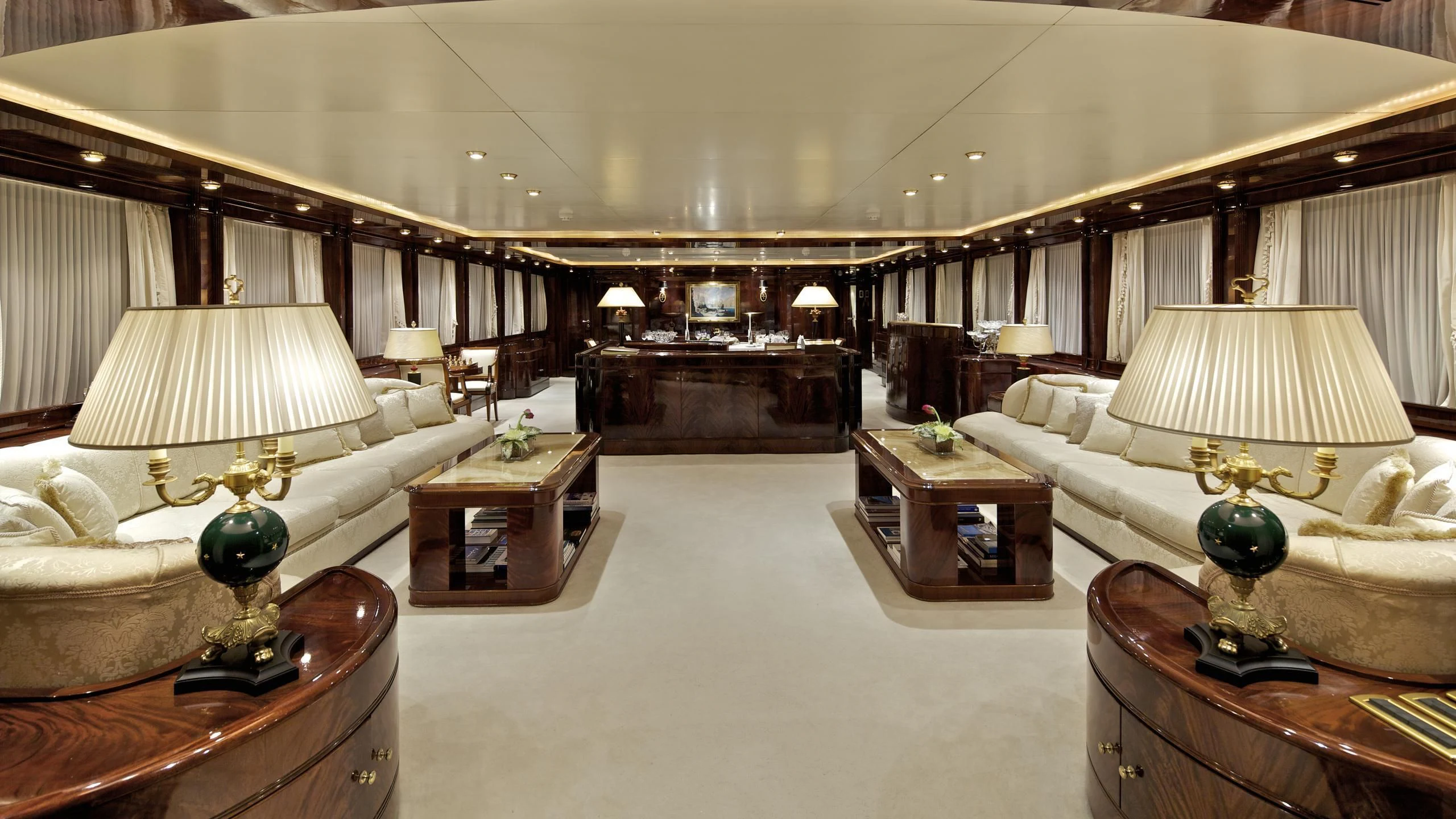 a large room with a piano and a piano aboard O'RION Yacht for Charter