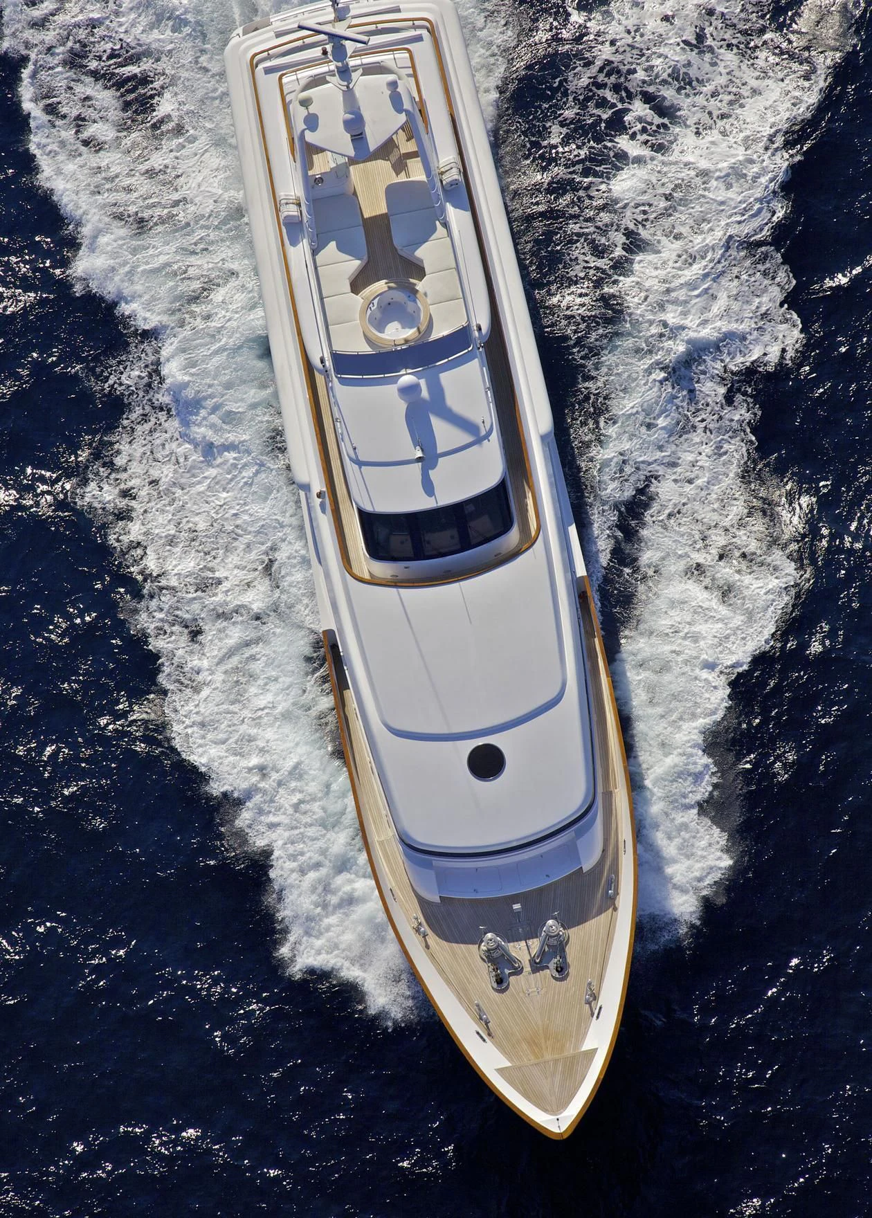a silver and gold sports car aboard O'RION Yacht for Charter