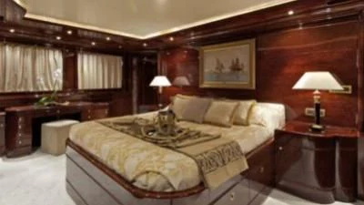 a large bedroom with a large bed aboard O'RION Yacht for Charter