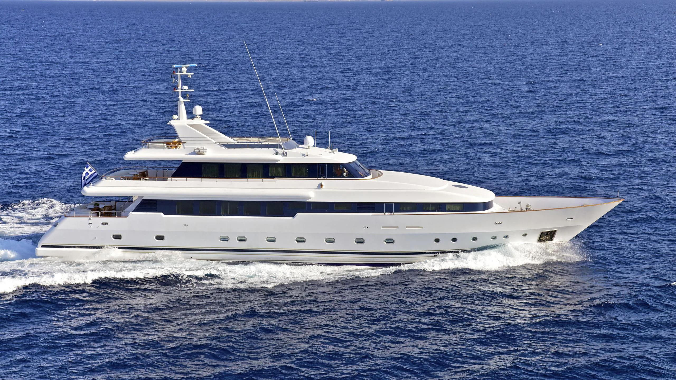 a white boat on the water aboard O'RION Yacht for Charter