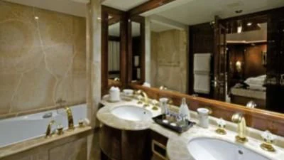 a bathroom with a large mirror aboard O'RION Yacht for Charter