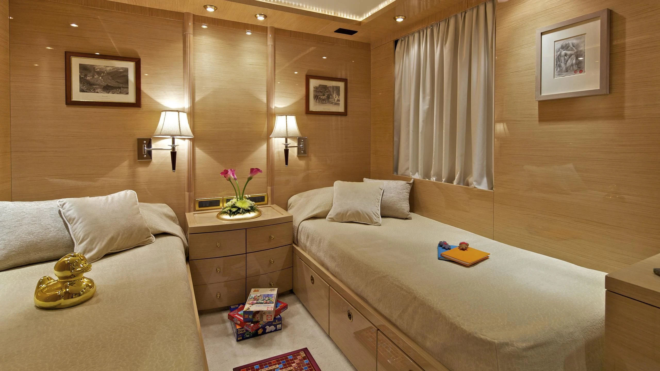 a room with a bed and a mirror aboard O'RION Yacht for Charter