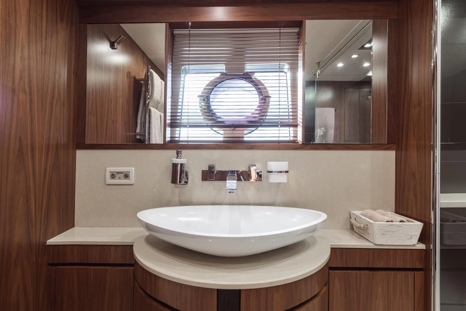 a bathroom with a sink and a mirror aboard FREAKY FRANKS Yacht for Sale
