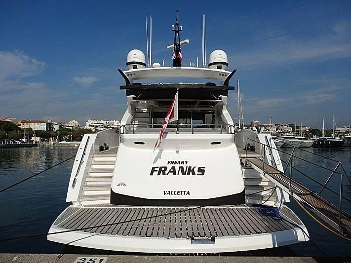 a boat docked at a pier aboard FREAKY FRANKS Yacht for Sale
