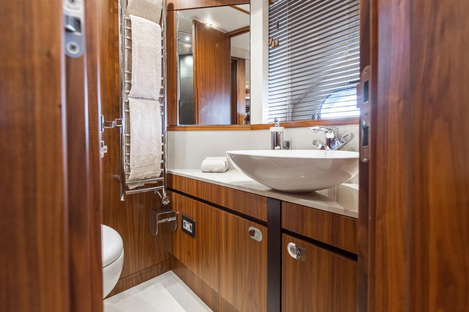 a bathroom with a sink and a toilet aboard FREAKY FRANKS Yacht for Sale