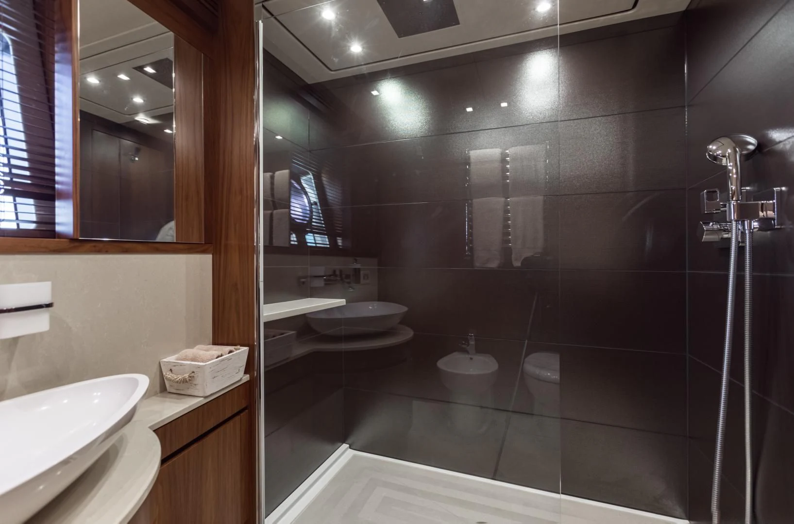 a bathroom with a large mirror aboard FREAKY FRANKS Yacht for Sale