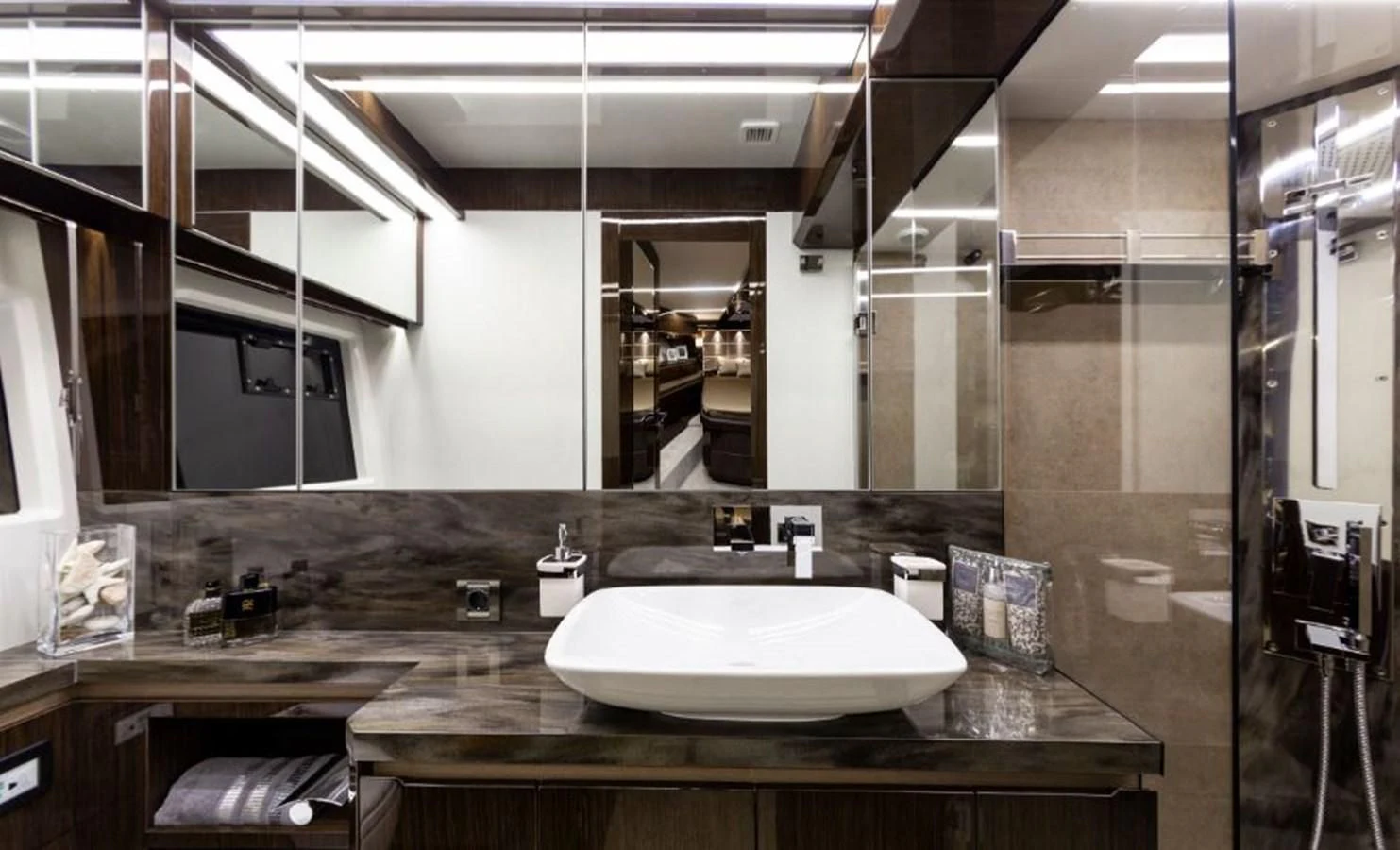 a bathroom with a large mirror aboard GALEON 640 Yacht for Sale