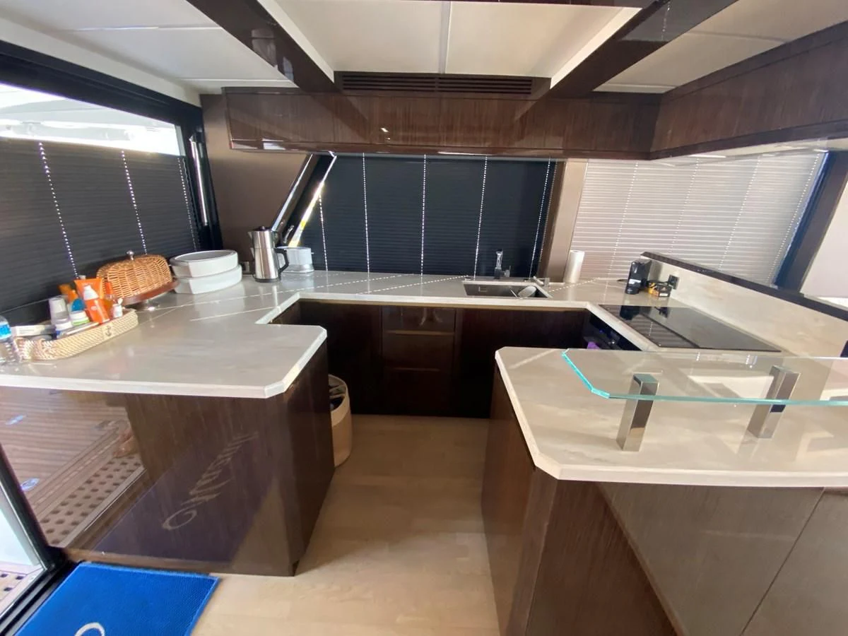 a kitchen with countertop sinks aboard GALEON 640 Yacht for Sale