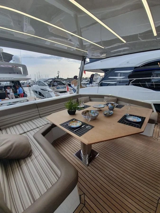 a table with food on it aboard GALEON 640 Yacht for Sale