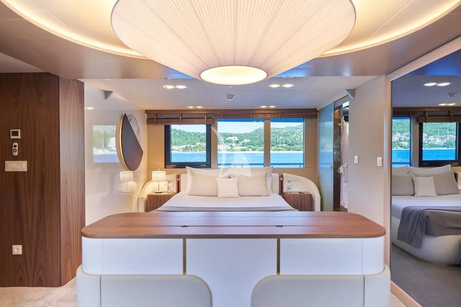 a room with a table and chairs aboard AETERNA Yacht for Sale