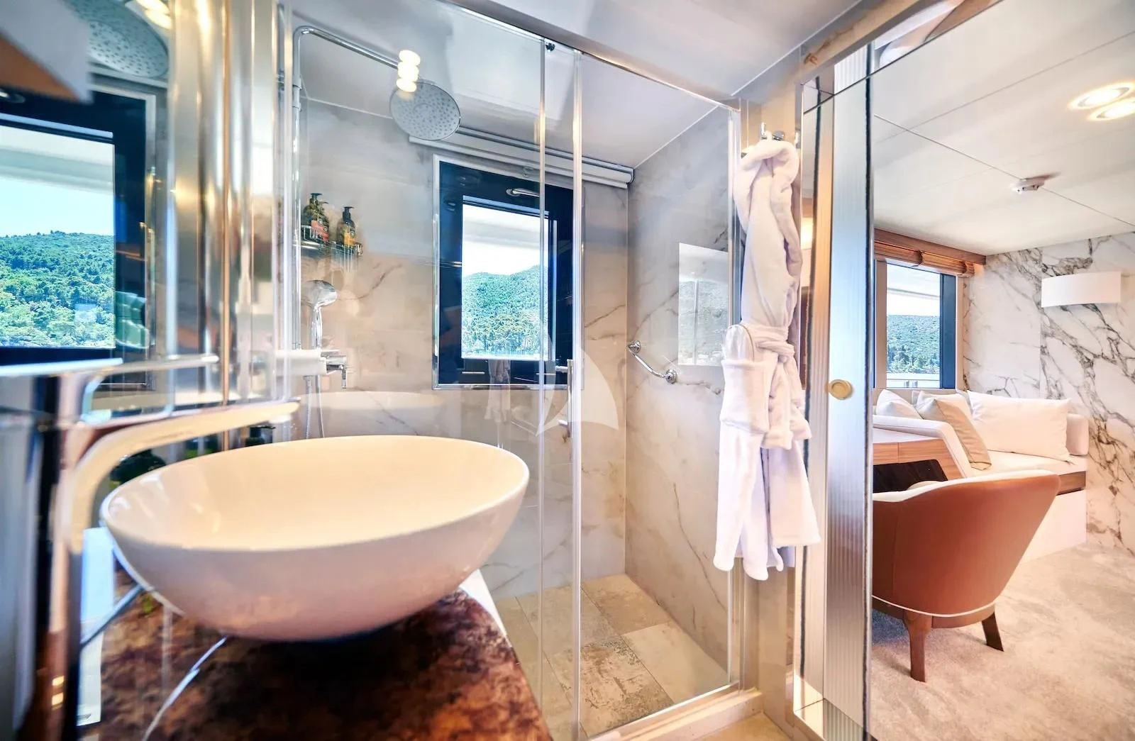 a bathroom with a tub and shower aboard AETERNA Yacht for Sale