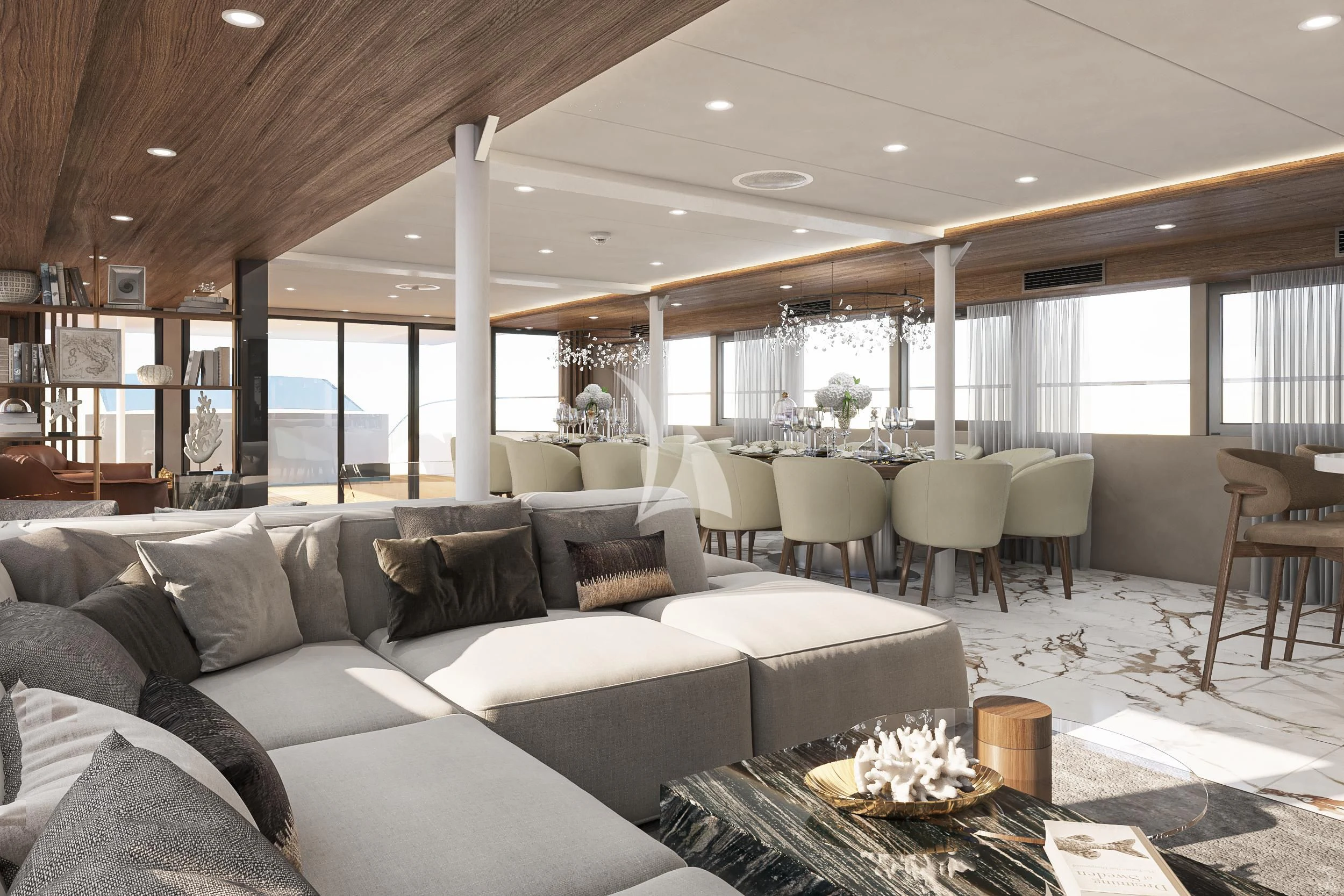 a living room with a large white couch and a large white table aboard AETERNA Yacht for Sale