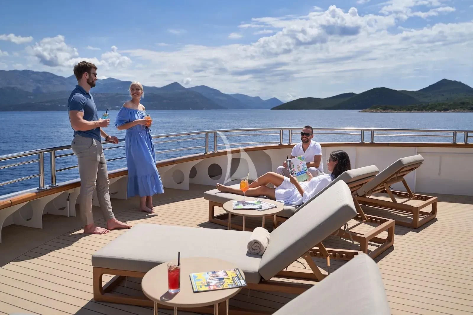 a group of people on a boat aboard AETERNA Yacht for Sale
