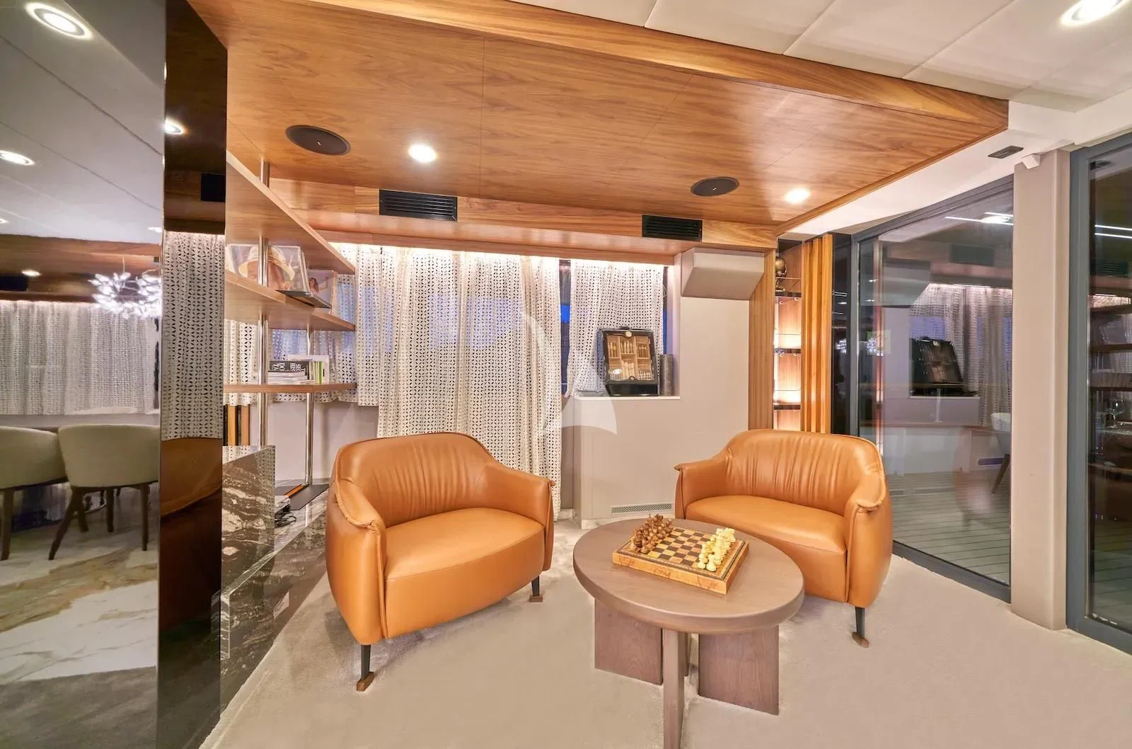 a living room with a couch and a coffee table aboard AETERNA Yacht for Sale