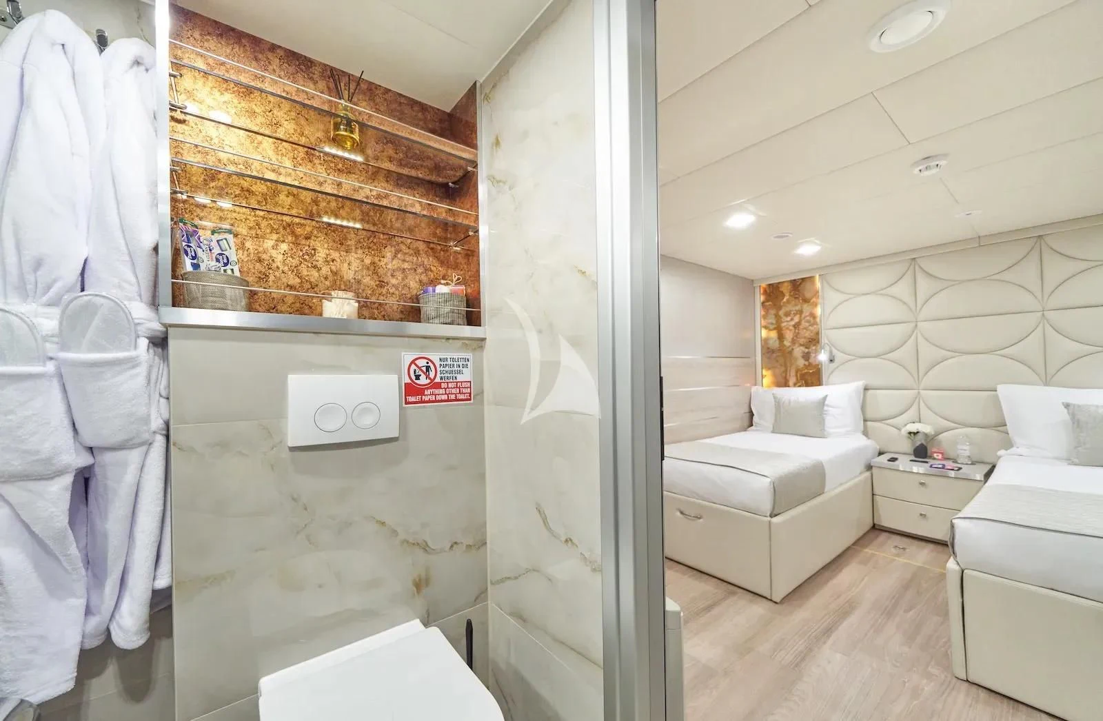 a room with a bed and a mirror aboard AETERNA Yacht for Sale
