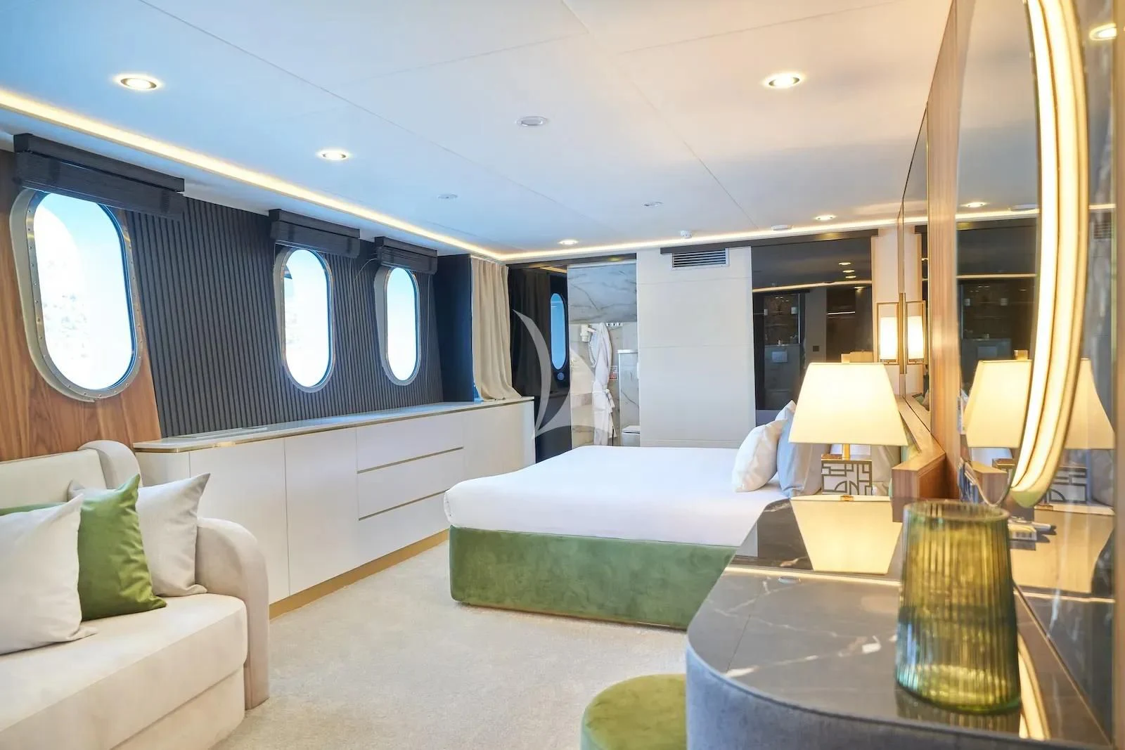 a room with a table and couch aboard AETERNA Yacht for Sale