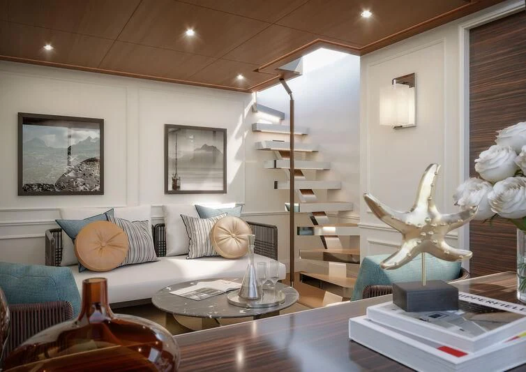 a living room with a white couch and a ladder aboard PICCHIOTTI GENTLEMAN YACHT 24M/01 Yacht for Sale