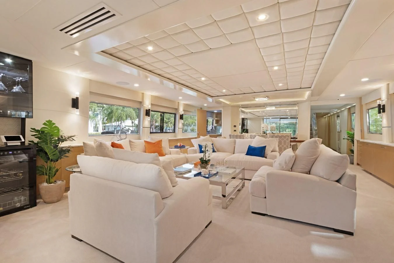 a living room with white couches aboard MARY KATHLENE Yacht for Sale