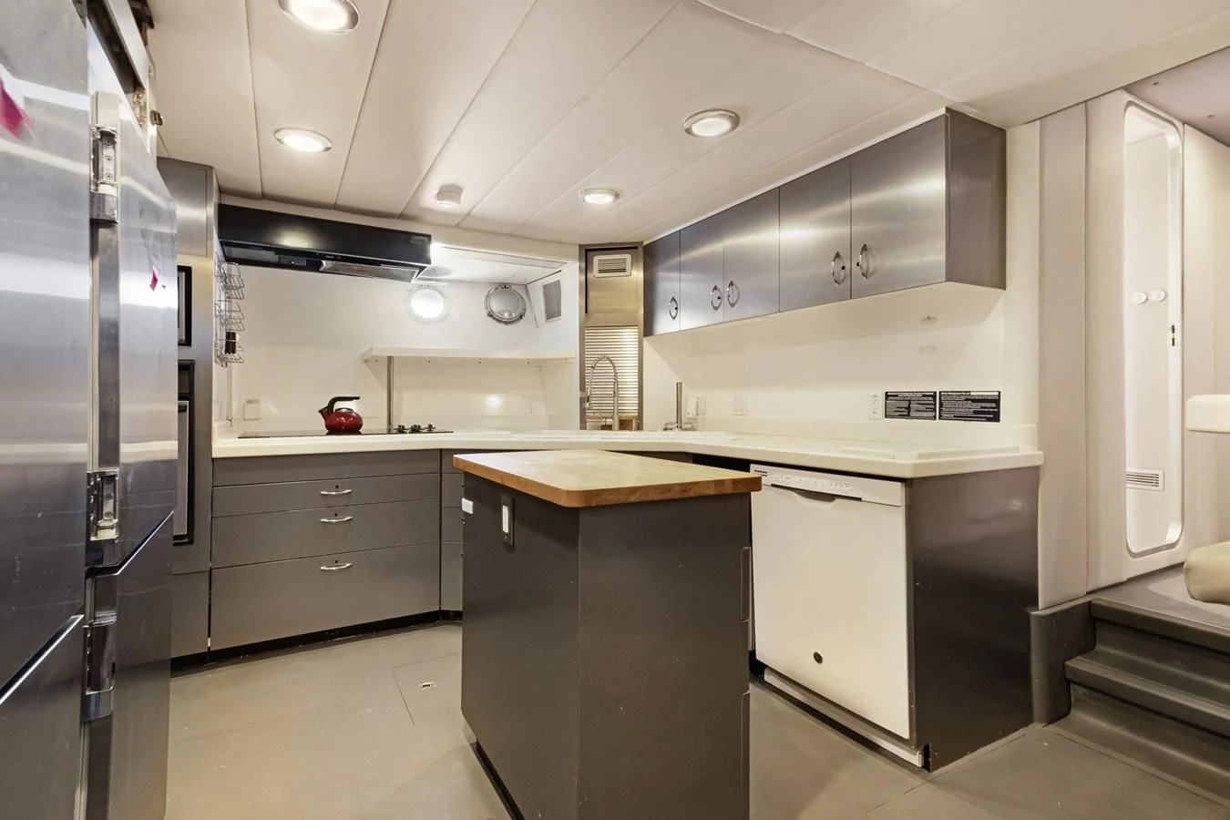 a kitchen with stainless steel appliances aboard MARY KATHLENE Yacht for Sale