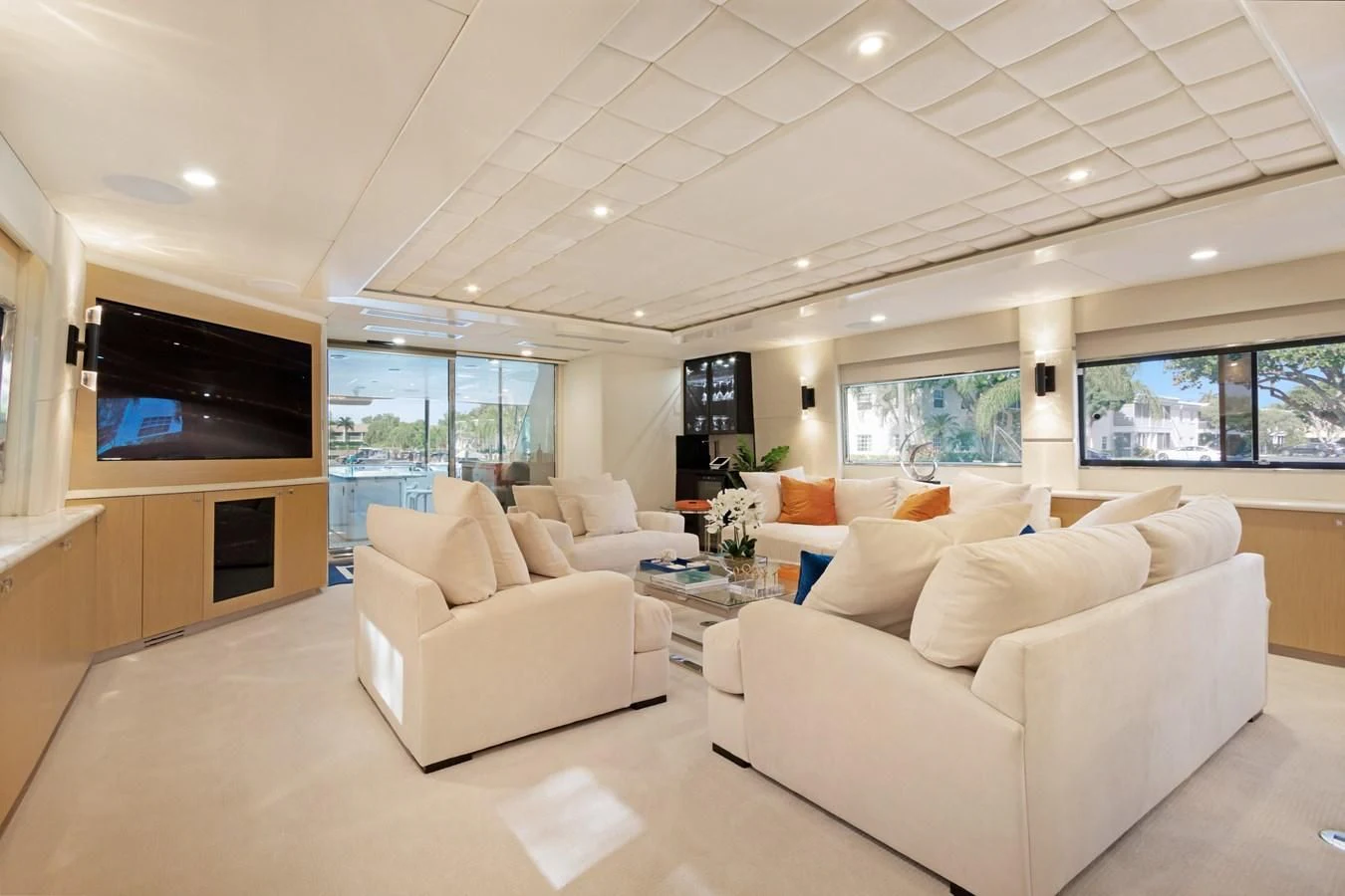 a living room with white furniture aboard MARY KATHLENE Yacht for Sale