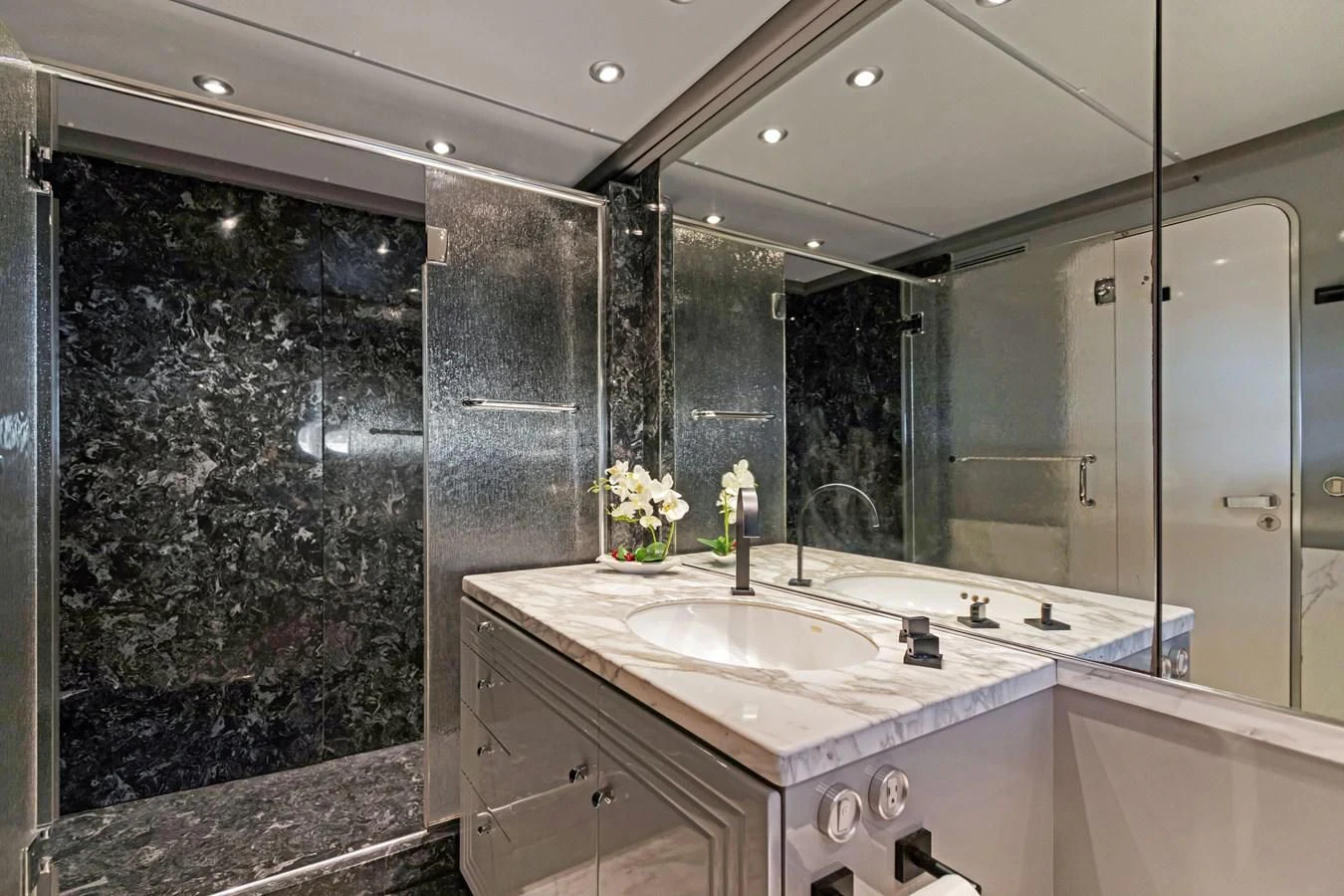 a bathroom with a large glass shower aboard MARY KATHLENE Yacht for Sale