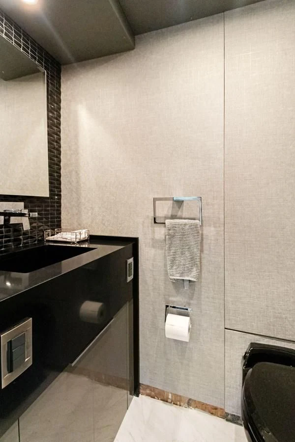 a bathroom with a sink and a mirror aboard MARY KATHLENE Yacht for Sale